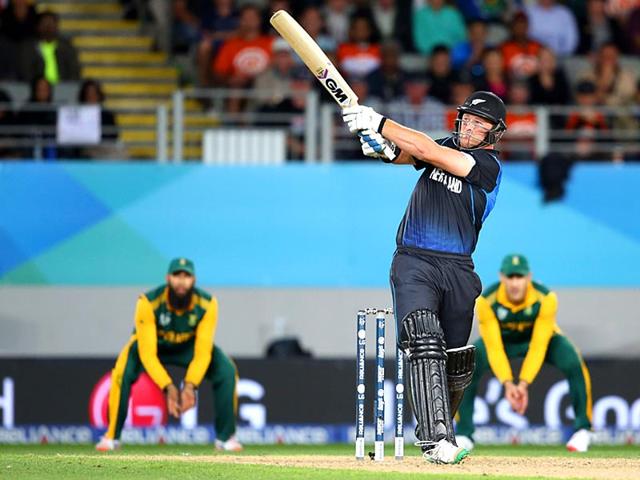 New Zealand's Corey Anderson plays a shot during the semi-final Cricket World Cup match between New Zealand and South Africa played at Eden Park in Auckland. (AFP Photo/Michael Bradley)