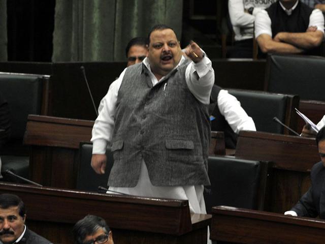 National Conference MLA Davinder Singh Rana arguing with Independent MLA Abdul Rashid during the budget session in Jammu. Nitin Kanotra/HT