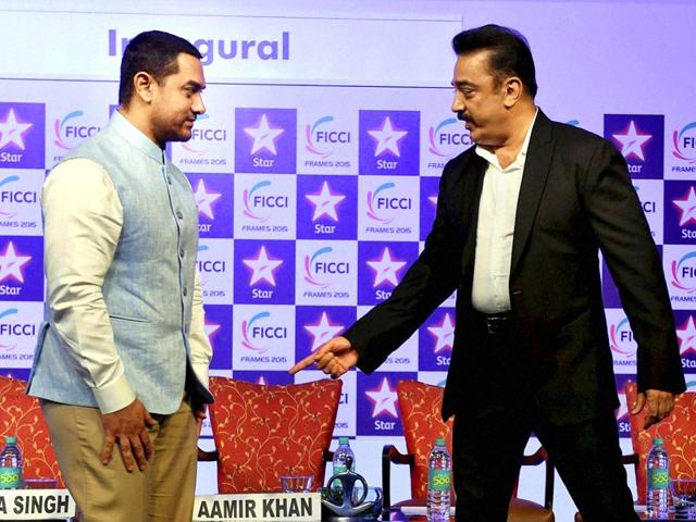 Actor Aamir Khan and Kamal Haasan during the inauguration of FICCI Frames at Powai in Mumbai. (HT photo)