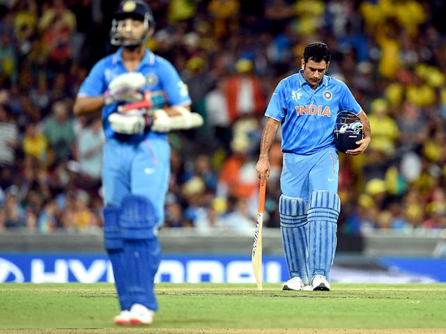 India-s-captain-Mahendra-Singh-Dhoni-R-reacts-after-fellow-batsman-Ajinkya-Rahane-L-was-dismissed-by-Australia-during-their-2015-Cricket-World-Cup-semifinal-match-in-Sydney--AFP-Photo India-s-captain-Mahendra-Singh-Dhoni-R-reacts-after-fellow-batsman-Ajinkya-Rahane-L-was-dismissed-by-Australia-during-their-2015-Cricket-World-Cup-semifinal-match-in-Sydney--AFP-Photo