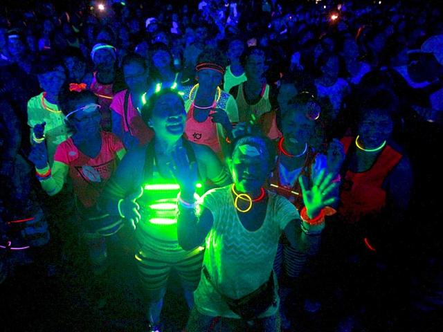 Participants perform aerodance during Earth Hour in Quezon city, Manila. The lights went down in parts of the Philippines on Saturday, as part of a climate change awareness campaign spanning multiple cities around the world. (Reuters)