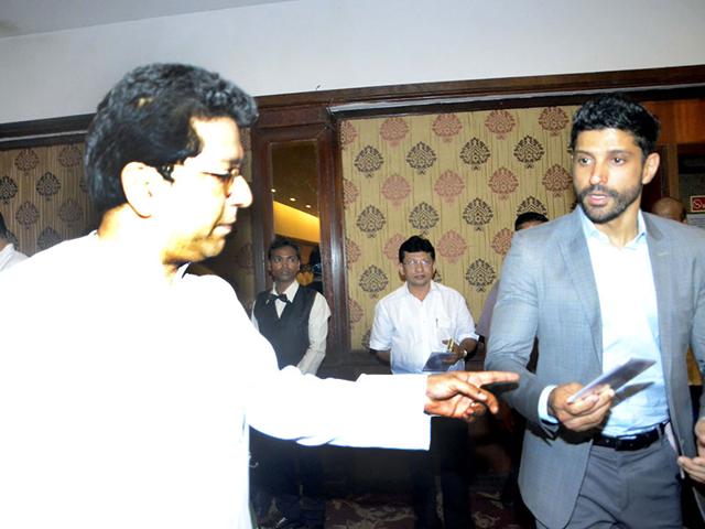 MNS chief Raj Thackeray with actor Farhan Akhtar during a seminar convened by MNS chief Raj Thackeray to discuss the controversial Mumbai Development Discussion (MDP) in Mumbai, on March 28, 2015. (Photo: IANS)