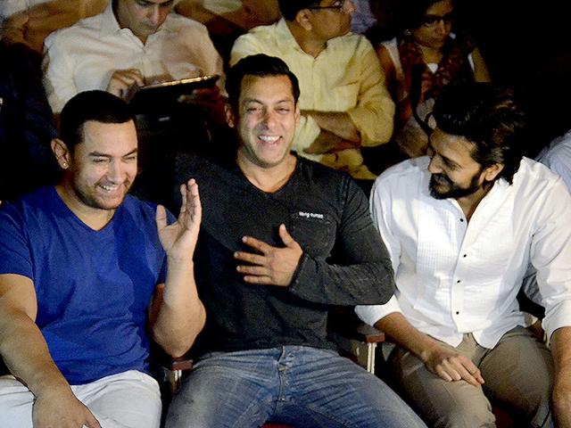 Aamir Khan, Salman Khan and Riteish Deshmukh share a light moment during a seminar convened by MNS chief Raj Thackeray to discuss the controversial Mumbai Development Discussion (MDP) in Mumbai, on March 28, 2015. (Photo: IANS)