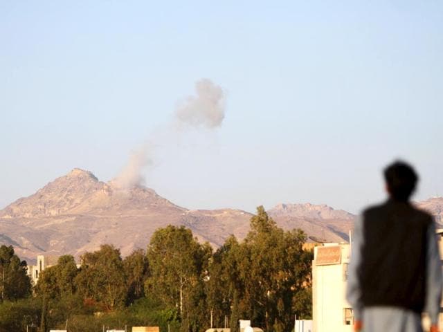 People-sit-on-ammunition-boxes-they-took-from-army-depots-in-Yemen-s-southern-port-city-of-Aden-as-Saudi-led-airstrikes-continued-againsty-Houthi-militia-Reuters-Photo