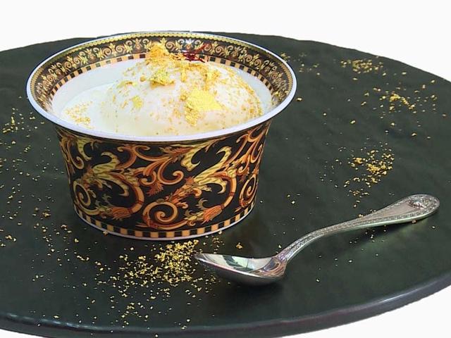 <p>This luxury desert called 'Black Diamond' costs over Rs. 50,000 and is thought to be the most expensive ice cream in the world. Made with Italian truffles, ambrosial Iranian saffron and edible 23-carat gold, the ice cream scoop is presented in this Versace bone china bowl in Dubai's Scoopi Cafe. Its creator, Indian businessman Zubin Doshi, says the $817 or Rs. 51,144 price tag is about right when you consider its unusual mix of ingredients.</p>