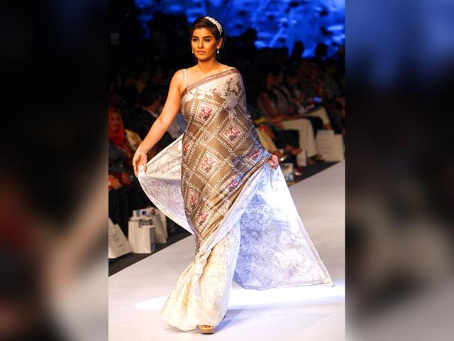 A model presents a creation by designer Madiha Raza. (Photo: IANS) 