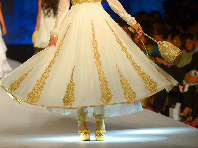 A model presents a creation by designer Gul Ahmed. (Photo: AFP) 