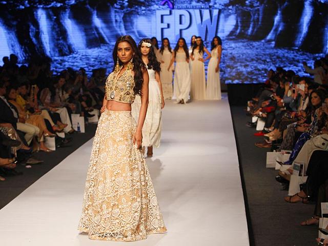 Models present creations by Pakistani designer Fnk Asia. (Photo: AP) 