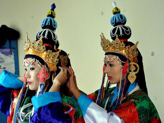 Tibetan artists in traditional costumes perform in an opera at the Tibetan Institute of Performing Arts (TIPA) on the closing ceremony of the 20th Shoton festival at Mcleodganj near Dharamsala. Shyam Sharma/HT