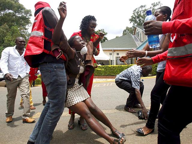 A-relative-is-assisted-by-Kenya-Red-Cross-staff-as-she-reacts-where-bodies-of-the-students-killed-in-Thursday-s-attack-by-gunmen-are-preserved-at-the-Chiromo-Mortuary-in-the-capital-Nairobi-Reuters A-relative-is-assisted-by-Kenya-Red-Cross-staff-as-she-reacts-where-bodies-of-the-students-killed-in-Thursday-s-attack-by-gunmen-are-preserved-at-the-Chiromo-Mortuary-in-the-capital-Nairobi-Reuters