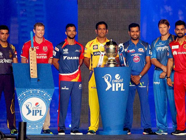 Captains of the IPL teams pose with the trophy during the IPL 2015 opening ceremony at Salt Lake Stadium in Kolkata. (PTI Photo)
