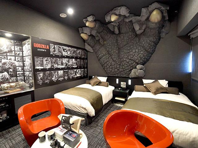 A Godzilla paw and posters of related movies are seen at the "Gozilla Room" of Hotel Gracery Shinjuku at Kabukicho shopping district in Tokyo. AFP/Toru Yamanaka A Godzilla paw and posters of related movies are seen at the "Gozilla Room" of Hotel Gracery Shinjuku at Kabukicho shopping district in Tokyo. AFP/Toru Yamanaka