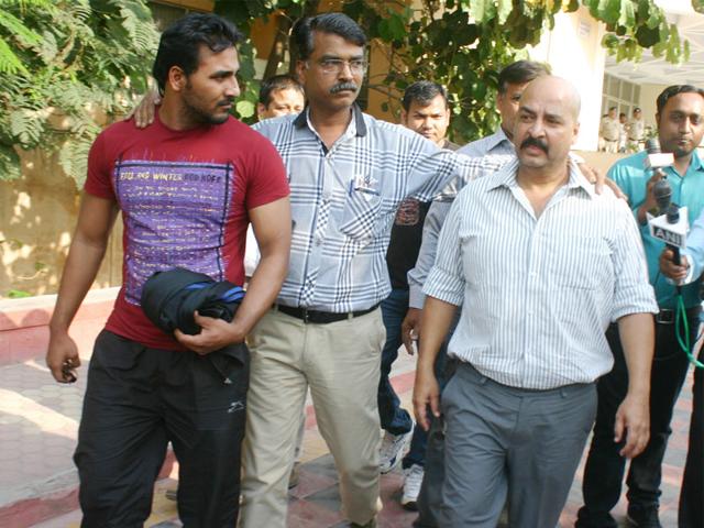 Real-estate-developer-Raja-Tomar-alias-Santosh-Singh-Tomar-right-in-white-shirt-and-Mohit-Sharma-were-arrested-by-STF-in-connection-with-forest-guard-recruitment-scam-2013-in-Bhopal-on-Friday-Bidesh-Manna-HT-photo Real-estate-developer-Raja-Tomar-alias-Santosh-Singh-Tomar-right-in-white-shirt-and-Mohit-Sharma-were-arrested-by-STF-in-connection-with-forest-guard-recruitment-scam-2013-in-Bhopal-on-Friday-Bidesh-Manna-HT-photo