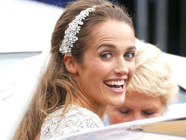 Kim Sears smiles as she leaves after marrying tennis player Andy Murray at the cathedral in Dunblane, Scotland. REUTERS/Russell Cheyne TPX IMAGES OF THE DAY