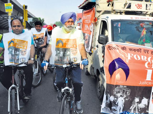Lawyer-and-AAP-leader-HS-Phoolka-takes-part-in-a-cycle-rally-seeking-justice-for-riot-victims-on-Saturday-Sushil-Kumar-HT-photo Lawyer-and-AAP-leader-HS-Phoolka-takes-part-in-a-cycle-rally-seeking-justice-for-riot-victims-on-Saturday-Sushil-Kumar-HT-photo