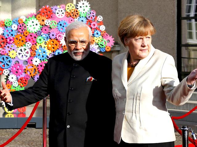 German-Chancellor-Angela-Merkel-right-gestures-next-to-Indian-Prime-Minister-Narendra-Modi-as-they-attend-the-opening-ceremony-of-the-world-s-largest-industrial-technology-fair-the-Hannover-Messe-in-Hanover-Reuters-Photo-- German-Chancellor-Angela-Merkel-right-gestures-next-to-Indian-Prime-Minister-Narendra-Modi-as-they-attend-the-opening-ceremony-of-the-world-s-largest-industrial-technology-fair-the-Hannover-Messe-in-Hanover-Reuters-Photo--