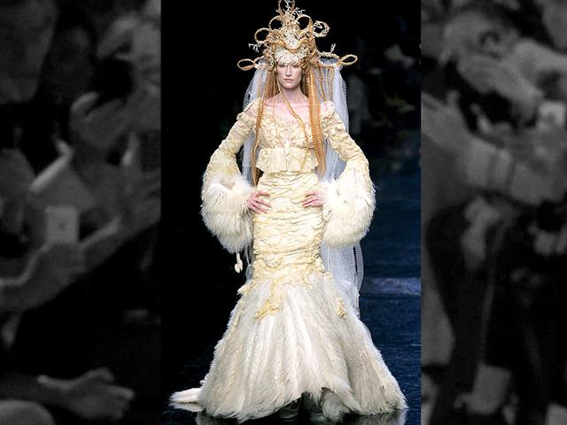 2005: Velvet and feathers adorn this wedding gown designed by Jean Paul Gaultier for his haute couture fall-winter 2005-2006 collection. 2005: Velvet and feathers adorn this wedding gown designed by Jean Paul Gaultier for his haute couture fall-winter 2005-2006 collection.