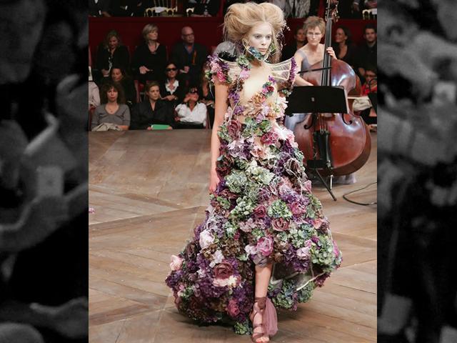 2006: A blossoming wedding gown unveiled by Alexander McQueen at his spring-summer 2007 show during Paris ready-to-wear fashion week. 2006: A blossoming wedding gown unveiled by Alexander McQueen at his spring-summer 2007 show during Paris ready-to-wear fashion week.