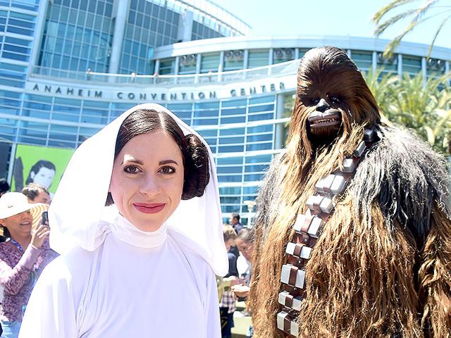 Fans, many dressed in costume, attend the opening day of the 25th Star Wars Convention in Anaheim, California, where some 100,000 people are expected for the four day convention. (AFP)