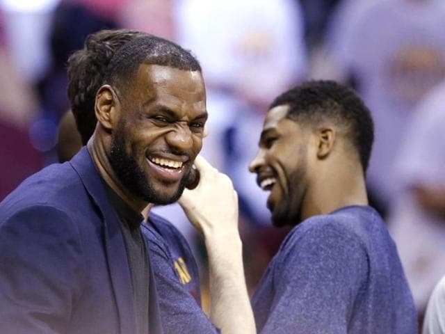 Cleveland-Cavaliers-LeBron-James-laughs-on-the-sidelines-in-the-fourth-quarter-of-the-game-against-the-Washington-Wizards-on-Wednesday-in-Cleveland-James-sat-out-to-rest-for-the-playoffs-AP-Photo