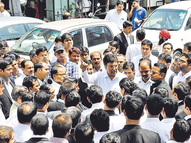 Lawyers-gather-near-the-spot-where-Rajeev-Sharma-was-found-dead-inside-the-Tis-Hazari-court-complex-on-Friday-Mohd-Zakir-HT-Photo Lawyers-gather-near-the-spot-where-Rajeev-Sharma-was-found-dead-inside-the-Tis-Hazari-court-complex-on-Friday-Mohd-Zakir-HT-Photo