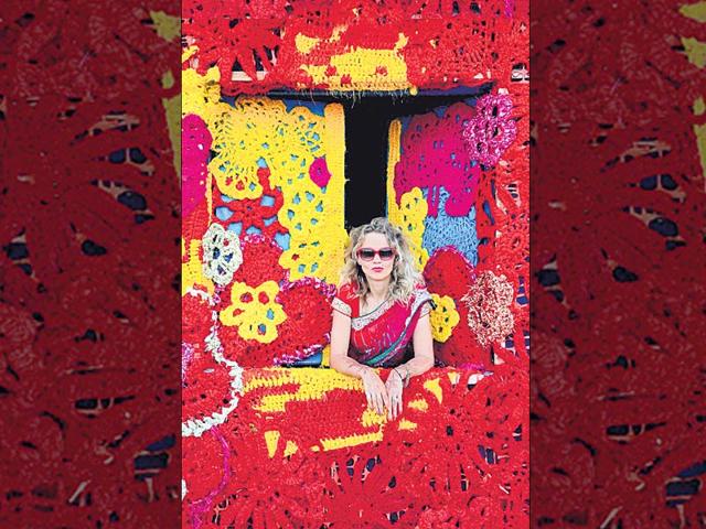 Olek, Poland: This artwork has taken the blues off the lives of those living in night shelters, literally. Using 9 km of fabric and other materials provided by fashion designers Tarun Tahiliani, Manish Arora and Rohit Bal, this project covered a night shelter near Sarai Kale Khan and involved housewives, working professionals, Afghan refugees and students - most of them being women. It was supported by the Delhi Urban Shelter Improvement Board. Olek, Poland: This artwork has taken the blues off the lives of those living in night shelters, literally. Using 9 km of fabric and other materials provided by fashion designers Tarun Tahiliani, Manish Arora and Rohit Bal, this project covered a night shelter near Sarai Kale Khan and involved housewives, working professionals, Afghan refugees and students - most of them being women. It was supported by the Delhi Urban Shelter Improvement Board.
