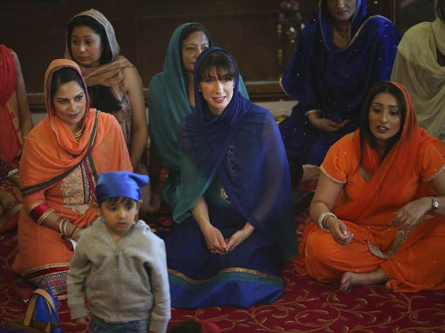 Britain's Prime Minister David Cameron's wife, Samantha, centre, sits with Conservative party Parliamentary candidate Priti Patel, centre left, during the Vaisakhi festival at Guru Nanak Darbar Gurdwara temple on Saturday.AP Britain's Prime Minister David Cameron's wife, Samantha, centre, sits with Conservative party Parliamentary candidate Priti Patel, centre left, during the Vaisakhi festival at Guru Nanak Darbar Gurdwara temple on Saturday.AP