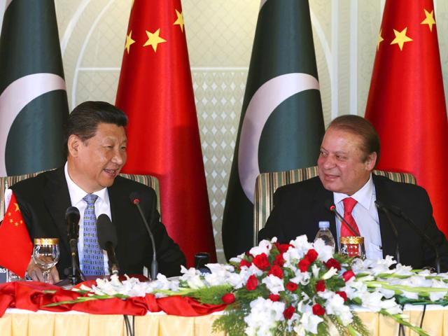 Chinese-President-Xi-Jinping-left-and-Pakistan-s-Prime-Minister-Nawaz-Sharif-attend-a-press-conference-after-their-talks-in-Islamabad-AP