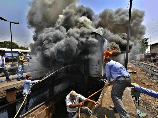 As-many-as-six-empty-coaches-of-two-Rajdhani-trains-were-gutted-in-the-fire-Tuesday-afternoon-at-New-Delhi-railway-station-s-maintenance-yard-Raj-K-Raj-HT-Photo As-many-as-six-empty-coaches-of-two-Rajdhani-trains-were-gutted-in-the-fire-Tuesday-afternoon-at-New-Delhi-railway-station-s-maintenance-yard-Raj-K-Raj-HT-Photo