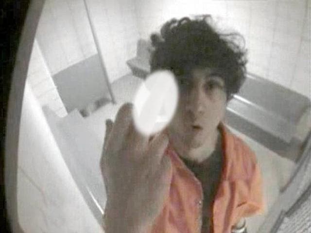 In-this-July-10-2013-surveillance-photo-released-by-the-US-attorney-s-office-Dzhokhar-Tsarnaev-extends-his-middle-finger-to-a-security-camera-in-his-jail-cell-AP-Photo In-this-July-10-2013-surveillance-photo-released-by-the-US-attorney-s-office-Dzhokhar-Tsarnaev-extends-his-middle-finger-to-a-security-camera-in-his-jail-cell-AP-Photo