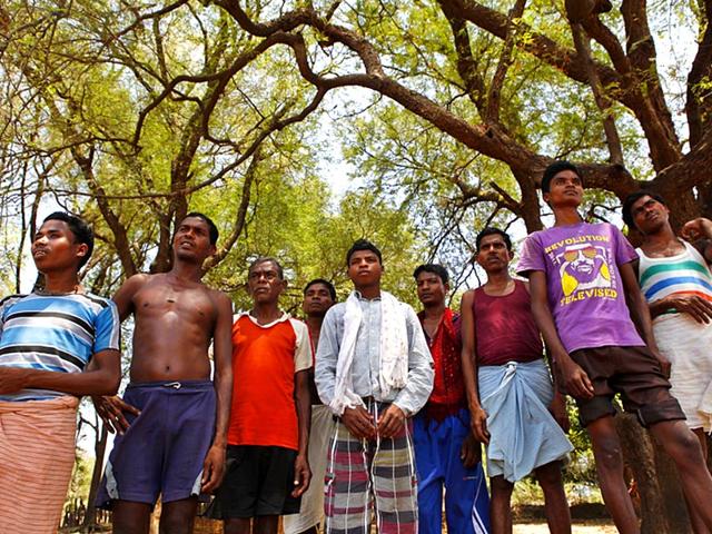 Men from Jangalpal village, Dantweada, who were accused of aiding Maoists in digging up a road. (Saumya Khandelwal/ HT Photo)