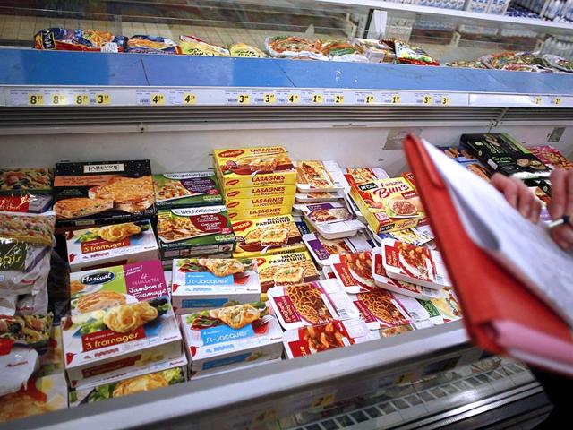 A-file-picture-taken-on-February-26-2013-shows-an-agent-of-DDPP-Departmental-protection-of-populations-conducting-a-verification-of-the-withdrawal-of-frozen-products-containing-horse-meat-in-Herouville-Saint-Clair-France-AFP-PHOTO A-file-picture-taken-on-February-26-2013-shows-an-agent-of-DDPP-Departmental-protection-of-populations-conducting-a-verification-of-the-withdrawal-of-frozen-products-containing-horse-meat-in-Herouville-Saint-Clair-France-AFP-PHOTO