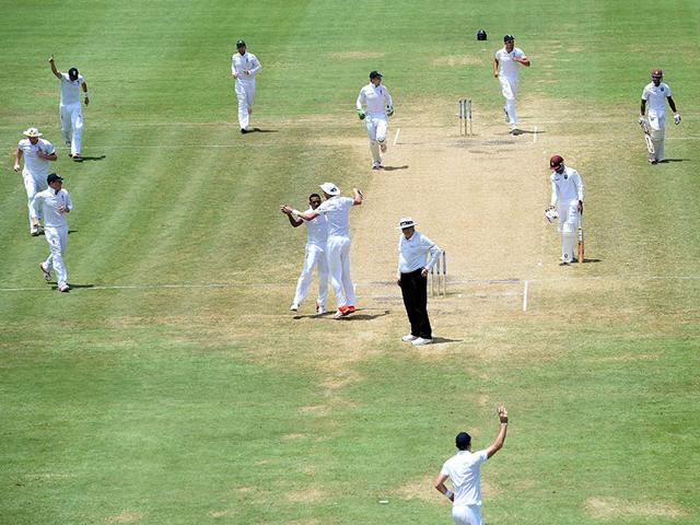 James-Anderson-bottom-celebrates-after-taking-a-catch-off-bowler-Chris-Jordan-to-dismiss-West-Indies-batsman-Jermaine-Blackwood-during-the-final-day-of-the-second-Test-match-between-the-West-Indies-and-England-at-the-Grenada-National-Cricket-Stadium-in-Saint-George-s-on-April-25-2015-AFP-Photo James-Anderson-bottom-celebrates-after-taking-a-catch-off-bowler-Chris-Jordan-to-dismiss-West-Indies-batsman-Jermaine-Blackwood-during-the-final-day-of-the-second-Test-match-between-the-West-Indies-and-England-at-the-Grenada-National-Cricket-Stadium-in-Saint-George-s-on-April-25-2015-AFP-Photo
