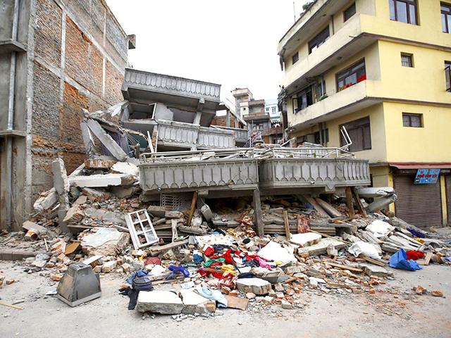 A-collapsed-building-after-7-9-magnitude-earthquake-hit-Kathmandu-Nepal-Reuters-Photo A-collapsed-building-after-7-9-magnitude-earthquake-hit-Kathmandu-Nepal-Reuters-Photo