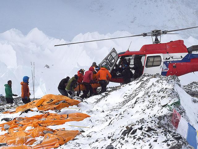 An-injured-person-is-loaded-onto-a-rescue-helicopter-at-Everest-Base-Camp-in-Nepal-AFP-Photo An-injured-person-is-loaded-onto-a-rescue-helicopter-at-Everest-Base-Camp-in-Nepal-AFP-Photo