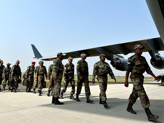 Indian-Army-personnel-board-an-Indian-Air-Force-aircraft-containing-relief-materials-to-be-airlifted-to-Nepal-to-provide-assistance-to-earthquake-victims-at-Hindon-Air-Force-Station-near-New-Delhi-AFP-Photo