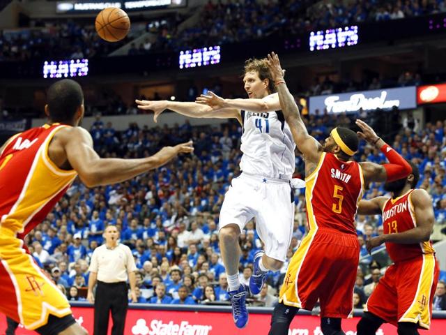 Dirk-Nowitzki-of-the-Dallas-Mavericks-passes-the-ball-back-in-the-second-half-of-Game-4-in-an-NBA-basketball-first-round-playoff-series-in-Dallas-AP-Photo Dirk-Nowitzki-of-the-Dallas-Mavericks-passes-the-ball-back-in-the-second-half-of-Game-4-in-an-NBA-basketball-first-round-playoff-series-in-Dallas-AP-Photo