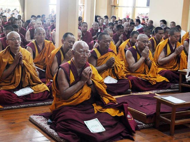 Monks and Tibetan leaders in exile during the special prayer ceremony for the earthquake victims at the Tsuglagkhang temple in Mcleodganj near Dharamsala. Shyam Sharma/HT