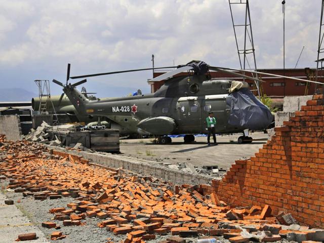A-wall-at-the-Kathmandu-airport-that-collapsed-during-the-earthquake-Chaos-has-reigned-at-Kathmandu-s-small-airport-since-the-earthquake-with-the-onslaught-of-relief-flights-causing-major-backups-on-the-tarmac-AP-Photo A-wall-at-the-Kathmandu-airport-that-collapsed-during-the-earthquake-Chaos-has-reigned-at-Kathmandu-s-small-airport-since-the-earthquake-with-the-onslaught-of-relief-flights-causing-major-backups-on-the-tarmac-AP-Photo