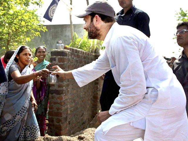 Congress-vice-president-Rahul-Gandhi-is-offered-water-by-a-village-woman-during-his-15-km-padyatra-in-Amravati-district-in-Vidarbha-region-of-Maharashtra-PTI-photo Congress-vice-president-Rahul-Gandhi-is-offered-water-by-a-village-woman-during-his-15-km-padyatra-in-Amravati-district-in-Vidarbha-region-of-Maharashtra-PTI-photo