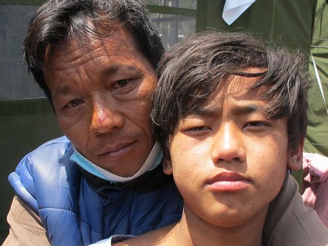 Nepal-earthquake-survivor-Pemba-Tamang-with-father-Surya-Tamang-HT-Photo Nepal-earthquake-survivor-Pemba-Tamang-with-father-Surya-Tamang-HT-Photo