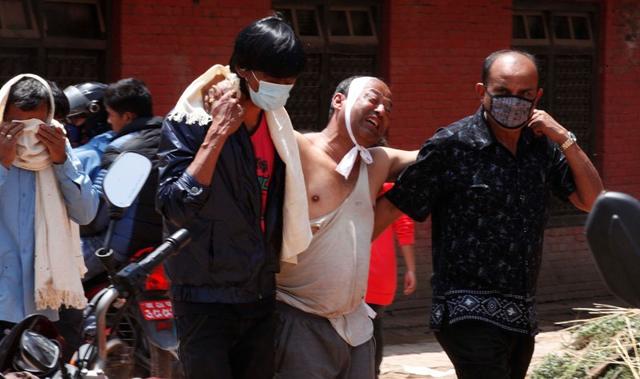 A-man-mourns-his-father-s-death-in-Bhakatpur-Nepal-Raj-K-Raj-HT-Photo A-man-mourns-his-father-s-death-in-Bhakatpur-Nepal-Raj-K-Raj-HT-Photo