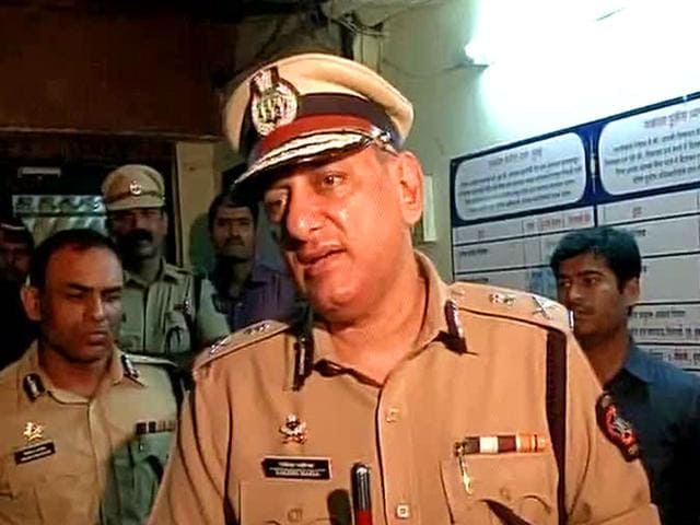 Rakesh-Maria-Mumbai-police-commissioner-briefs-the-media-on-what-happened-inside-the-police-station-where-an-officer-shot-at-another-and-then-turned-the-gun-on-himself-ANI-Photo Rakesh-Maria-Mumbai-police-commissioner-briefs-the-media-on-what-happened-inside-the-police-station-where-an-officer-shot-at-another-and-then-turned-the-gun-on-himself-ANI-Photo
