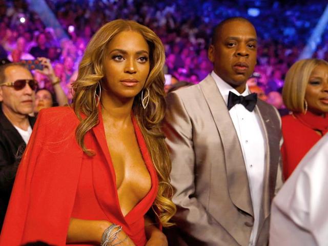 Beyonce Knowles and Jay Z attend the welterweight unification championship bout on May 2, 2015 at MGM Grand Garden Arena in Las Vegas, Nevada. (Photo: AFP)