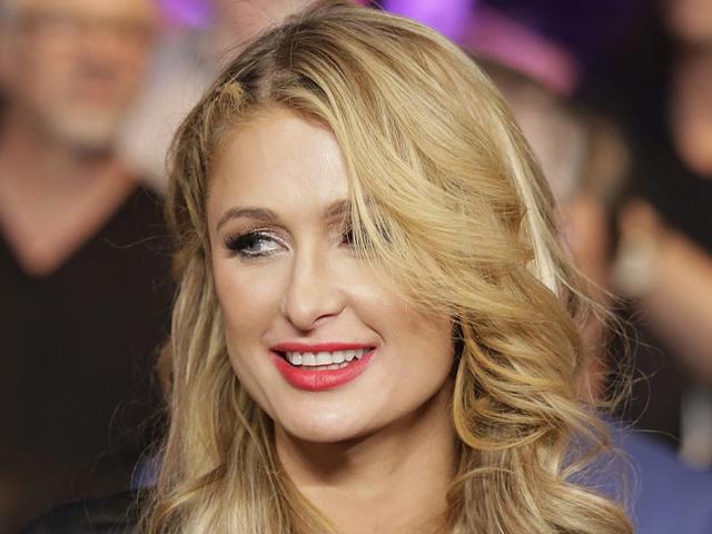 Paris Hilton enters the arena before the start of the world welterweight championship bout between Floyd Mayweather Jr., and Manny Pacquiao, on Saturday, May 2, 2015 in Las Vegas.(Photo: AP)