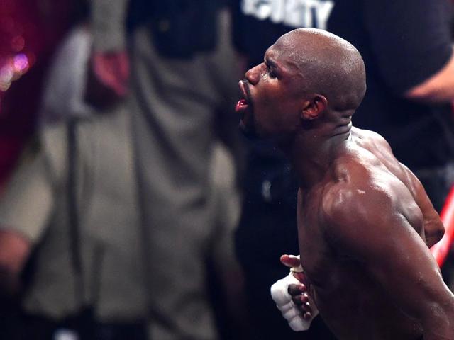 Floyd-Mayweather-Jr-of-the-US-poses-with-his-title-belts-after-defeating-Manny-Pacquiao-of-the-Philippines-in-their-welterweight-WBO-WBC-and-WBA-Super-title-fight-in-Las-Vegas-on-Saturday-Reuters-Photo Floyd-Mayweather-Jr-of-the-US-poses-with-his-title-belts-after-defeating-Manny-Pacquiao-of-the-Philippines-in-their-welterweight-WBO-WBC-and-WBA-Super-title-fight-in-Las-Vegas-on-Saturday-Reuters-Photo