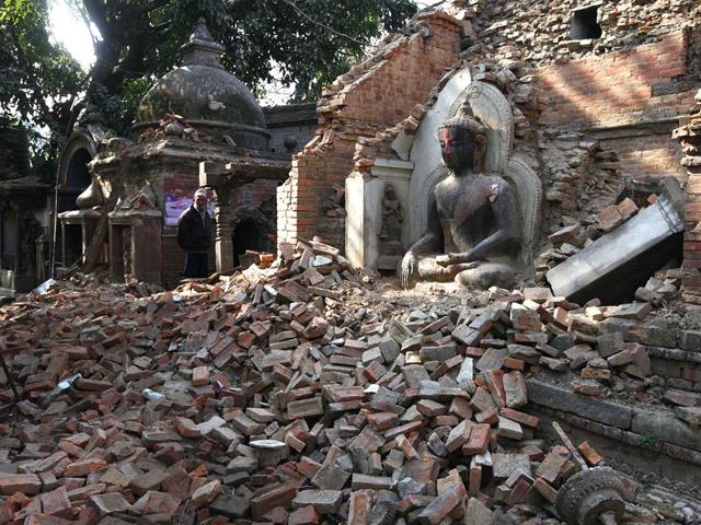 An idol of Lord Buddha amid rubble after the devastating Nepal earthquake, on the outskirts of Kathmandu. (Raj K Raj/ HT Photo)