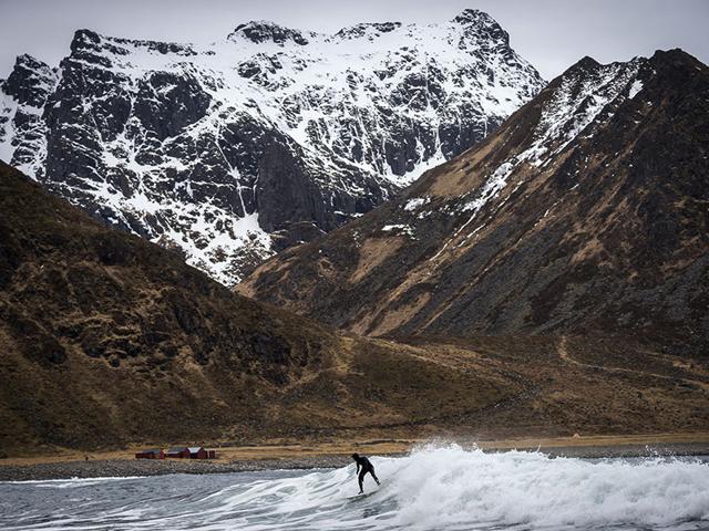 Situated-at-the-same-latitude-as-northern-Siberia-and-Alaska-Unstad-Beach-in-Norway-s-idyllic-Lofoten-Islands-is-a-favourite-spot-for-surfers-seeking-out-a-completely-different-kind-of-beach-experience-AFP