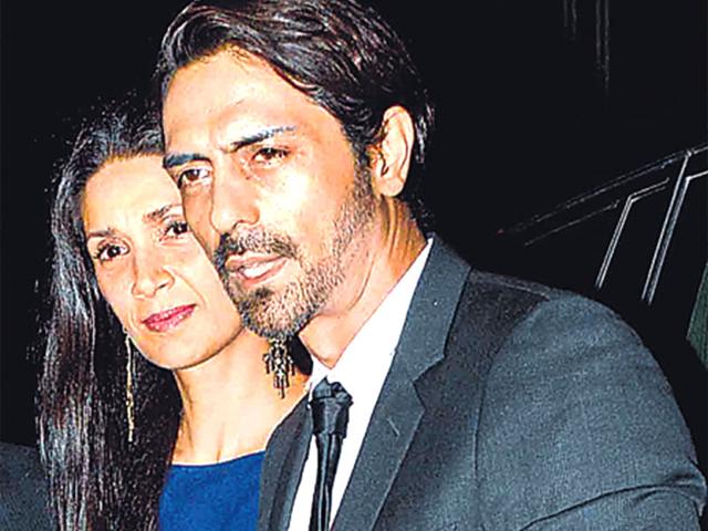 Arjun Rampal and Mehr Jessia made a public appearance together after a long time. They attended Abhishek Kapoor's wedding reception. (HT photo)