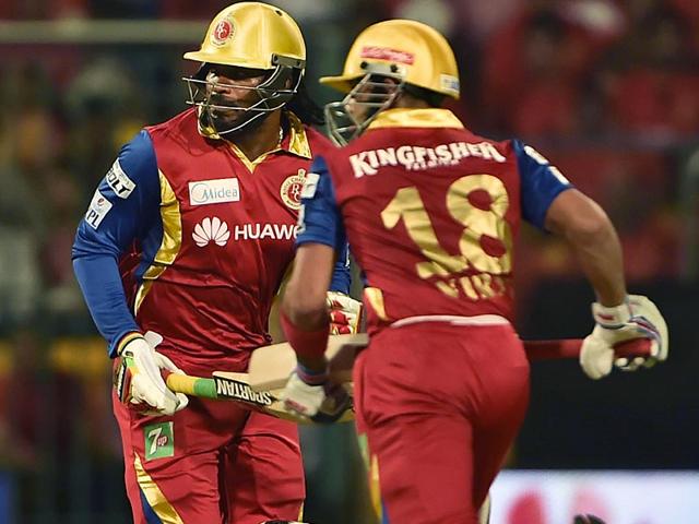 RCB skipper Virat Kohli and Gayle stitched a 119-run opening stand in just 11.2 overs. (Virendra Singh Gosain/HT Photo)